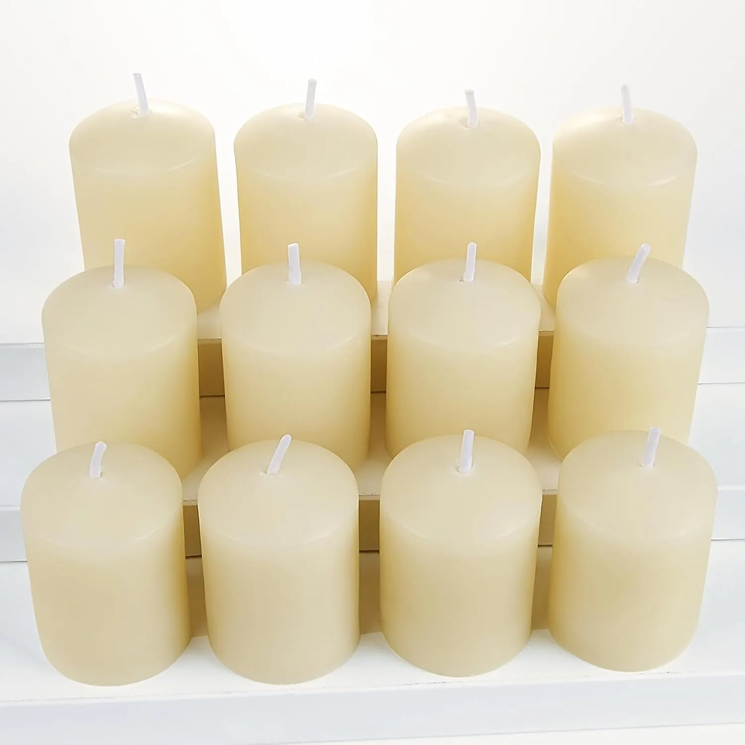 Natural Beeswax Votives — Candles available to rent